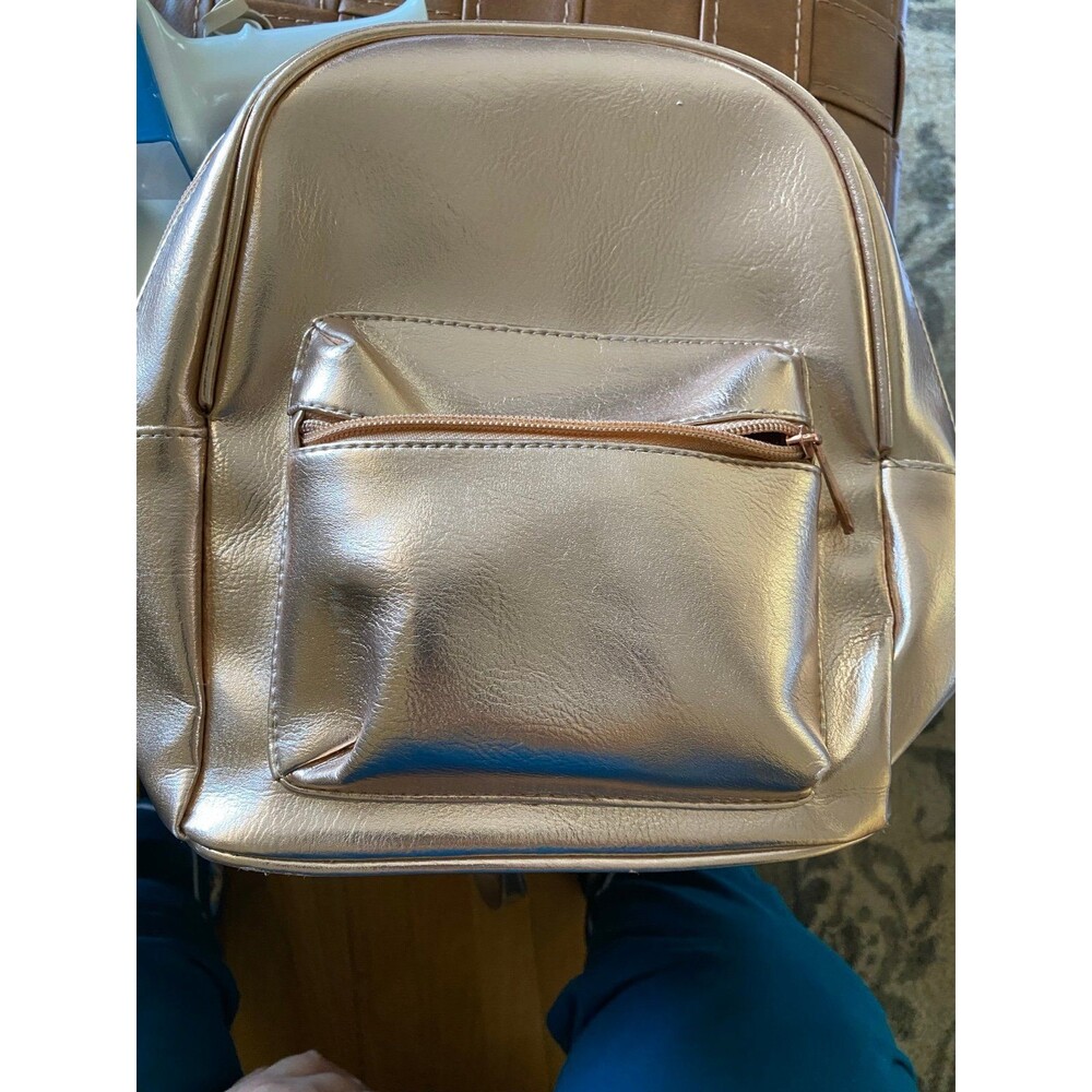 Pretty Rose gold Rue21 backpack for teens and tweens with multi-compartments